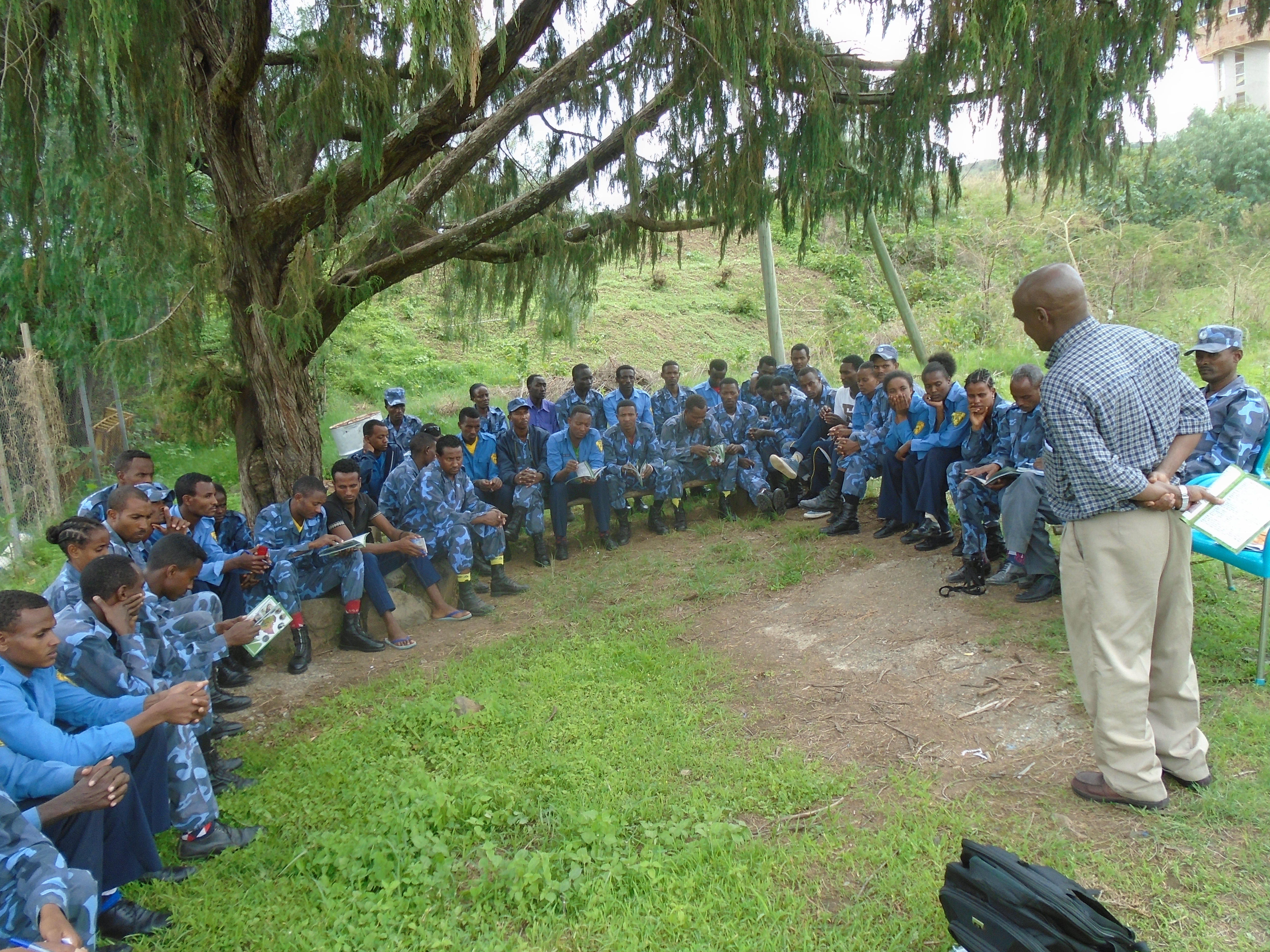 man teaching guards